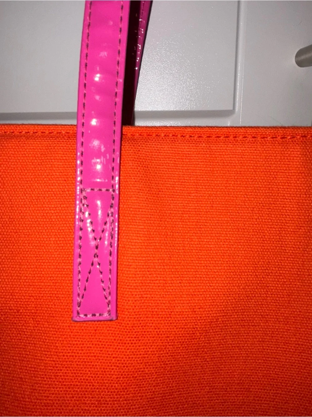 kate spade orange canvas tote with pink handles EUC